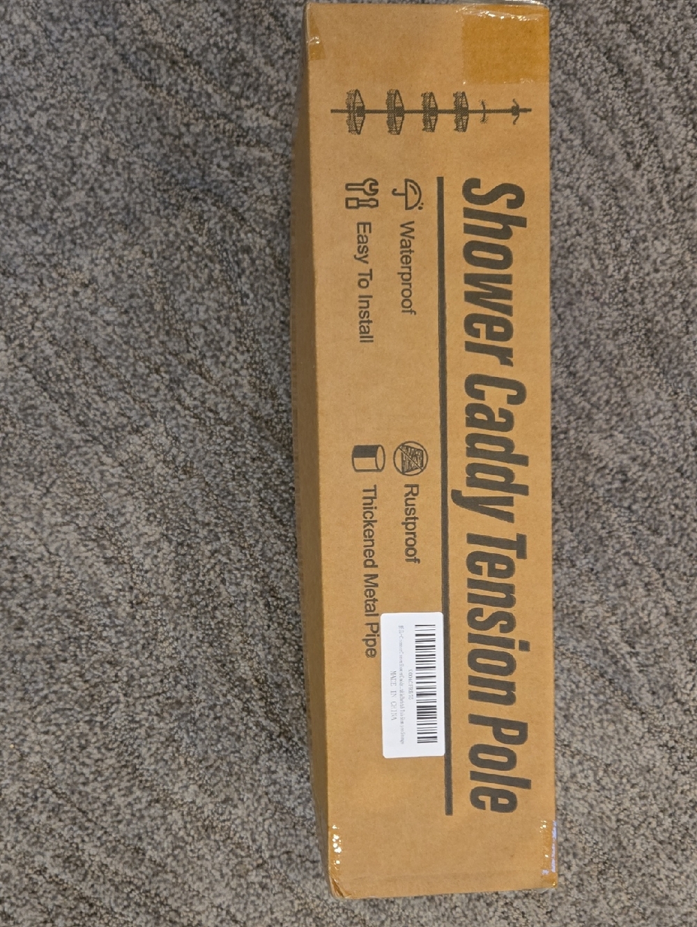 Shower Caddy Tension Pole in Brown Cardboard Packaging